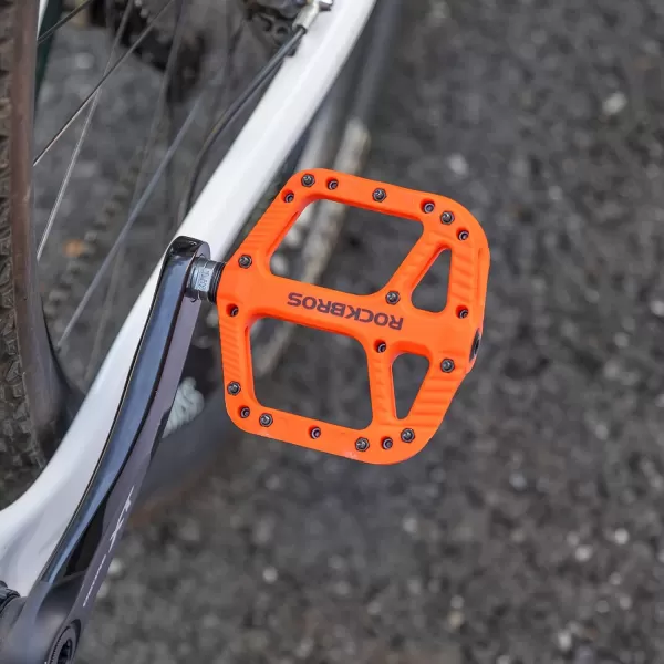 imageRock BROS Mountain Bike Pedals Nylon Composite Bearing 916quot MTB Bicycle Pedals with Wide Flat PlatformOrange
