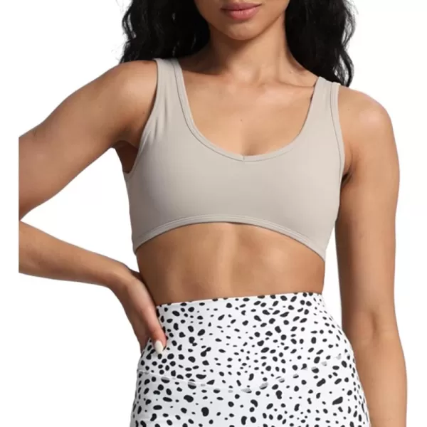 imageAoxjox Womens Workout Sports Bras Basic Baddie Fitness Backless Training Gym Bra Yoga Crop Tank TopMink