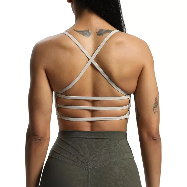 imageAoxjox Womens Workout Sports Bras Fitness Backless Padded Amor Low Impact Bra Yoga Crop Tank TopMink