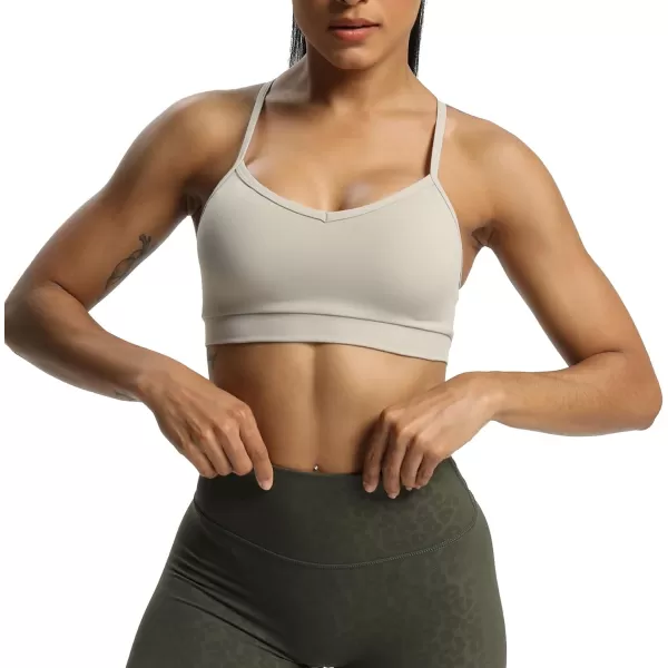 imageAoxjox Womens Workout Sports Bras Fitness Backless Padded Amor Low Impact Bra Yoga Crop Tank TopMink