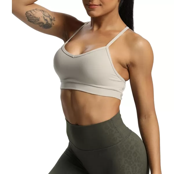 imageAoxjox Womens Workout Sports Bras Fitness Backless Padded Amor Low Impact Bra Yoga Crop Tank TopMink