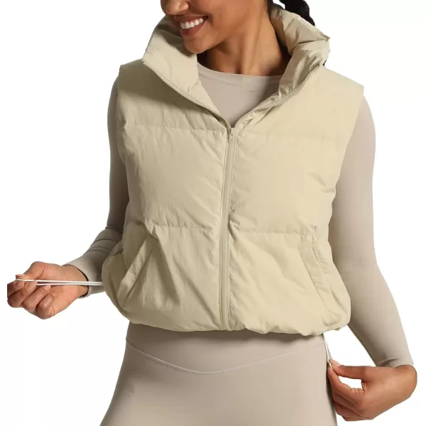 imageAoxjox Women Penelope Puffer Vest Lightweight Autumn Winter Outerwear Warm Stand Collar Cropped Down with PocketsIvory Nude