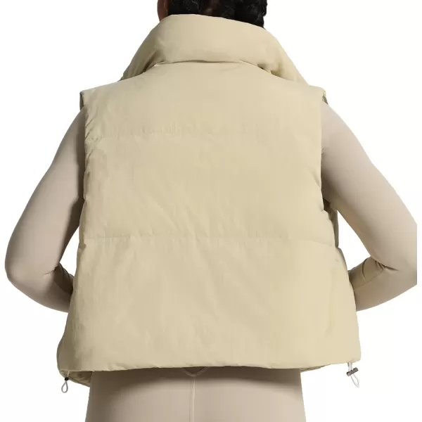 imageAoxjox Women Penelope Puffer Vest Lightweight Autumn Winter Outerwear Warm Stand Collar Cropped Down with PocketsIvory Nude
