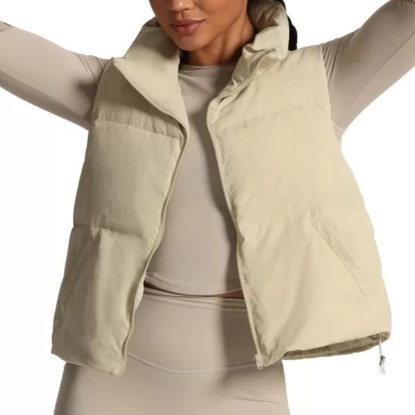 imageAoxjox Women Penelope Puffer Vest Lightweight Autumn Winter Outerwear Warm Stand Collar Cropped Down with PocketsIvory Nude