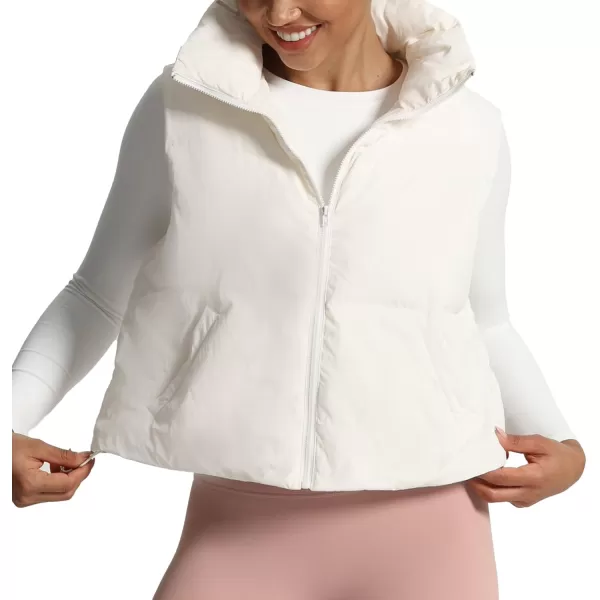 imageAoxjox Women Penelope Puffer Vest Lightweight Autumn Winter Outerwear Warm Stand Collar Cropped Down with PocketsWhite