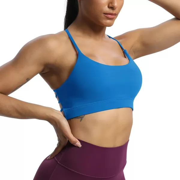 imageAoxjox Womens Workout Sports Bras Fitness Julie Crossback Thin Straps Padded Low Impact Bra Yoga Crop Tank TopDirectoire Blue