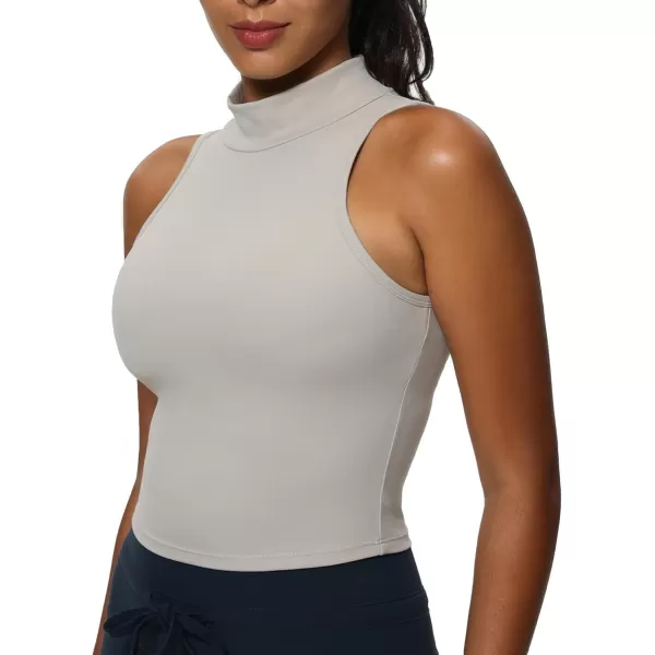 imageAoxjox Womens High Neck Tank Top Sleeveless Kim Cutout Tank Training Workout T Shirt TopMink