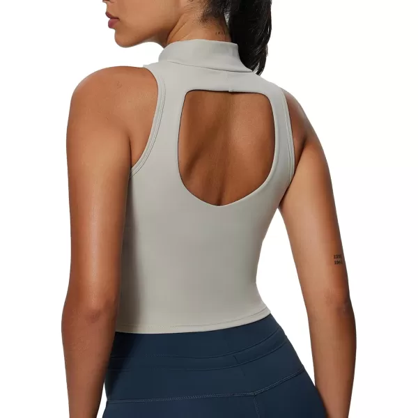 imageAoxjox Womens High Neck Tank Top Sleeveless Kim Cutout Tank Training Workout T Shirt TopMink