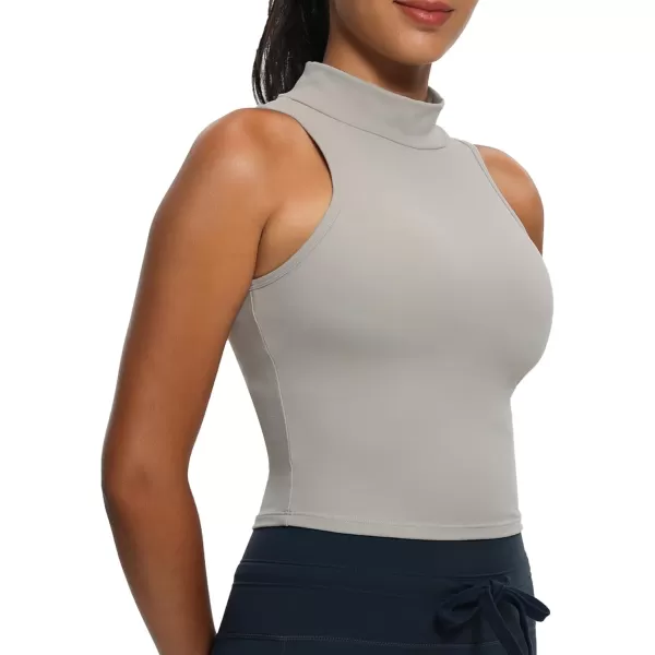 imageAoxjox Womens High Neck Tank Top Sleeveless Kim Cutout Tank Training Workout T Shirt TopMink