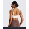 imageAoxjox Womens Workout Ellie Sports Bra Cutout Training Fitness Running Yoga Crop Tank TopWhite