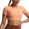imageAoxjox Short Sleeve Crop Tops for Women Clarissa Hollow Back Workout Cropped T Shirt TopPapaya