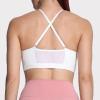 imageAoxjox Sports Bras for Women Workout Fitness Ruched Training Baddie Cross Back Yoga Crop TankA White