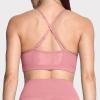 imageAoxjox Sports Bras for Women Workout Fitness Ruched Training Baddie Cross Back Yoga Crop TankPink