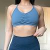 imageAoxjox Sports Bras for Women Workout Fitness Ruched Training Baddie Cross Back Yoga Crop TankSteel Blue