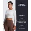 imageAoxjox Long Sleeve Crop Tops for Women Emma Twist Back Workout Cropped T Shirt TopWhite