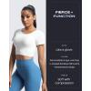 imageAoxjox Short Sleeve Crop Tops for Women Emma Backless Twist Back Workout Cropped T Shirt TopA White