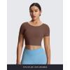 imageAoxjox Short Sleeve Crop Tops for Women Emma Backless Twist Back Workout Cropped T Shirt TopFudge Coffee