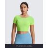 imageAoxjox Short Sleeve Crop Tops for Women Emma Backless Twist Back Workout Cropped T Shirt TopParadise Green