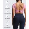 imageAoxjox Short Sleeve Crop Tops for Women Emma Backless Twist Back Workout Cropped T Shirt TopPrism Pink
