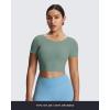 imageAoxjox Short Sleeve Crop Tops for Women Emma Backless Twist Back Workout Cropped T Shirt TopSage Green
