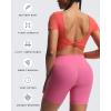 imageAoxjox Short Sleeve Crop Tops for Women Emma Backless Twist Back Workout Cropped T Shirt TopSpiced Coral