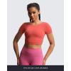 imageAoxjox Short Sleeve Crop Tops for Women Emma Backless Twist Back Workout Cropped T Shirt TopSpiced Coral