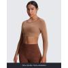 imageAoxjox Workout Long Sleeve Crop Tops for Women Clarissa Backless Gym Cropped T Shirt TopBrownie