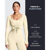 image:imageAoxjox Womens Athlenza Ruffle Wrap Tie Front Tops Long Sleeve Shrug Crop Top Ballet Yoga Workout CardiganOat Milk