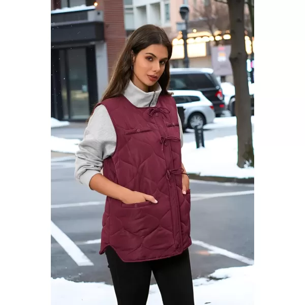 imageECOWISH Women Puffer Vest Sleeveless Jacket Button Zip Up Winter Coat Quilted Padded Warm Gilet Outerwear with PocketsWine Red