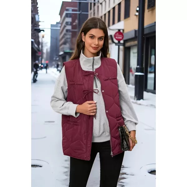 imageECOWISH Women Puffer Vest Sleeveless Jacket Button Zip Up Winter Coat Quilted Padded Warm Gilet Outerwear with PocketsWine Red