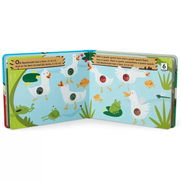 imageMelissa ampamp Doug Childrens Book  PokeaDot Old MacDonalds Farm Board Book with Buttons to Pop  FSC Certified