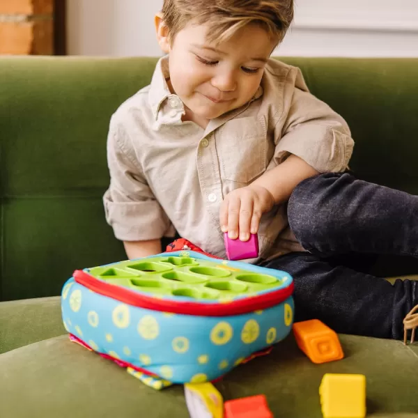 imageMelissa ampamp Doug Ks Kids TakeAlong Shape Sorter Baby Toy With 2Sided Activity Bag and 9 Textured Shape Blocks Sensory Toys Travel Shape Sorter Toys For Toddlers And Infants