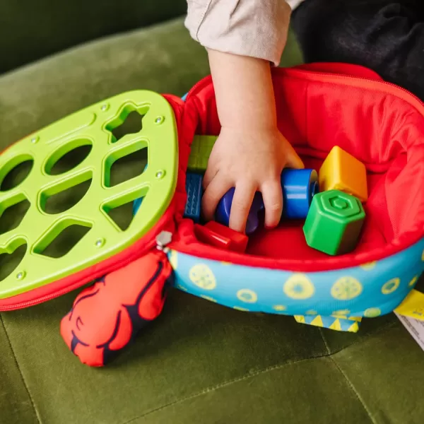 imageMelissa ampamp Doug Ks Kids TakeAlong Shape Sorter Baby Toy With 2Sided Activity Bag and 9 Textured Shape Blocks Sensory Toys Travel Shape Sorter Toys For Toddlers And Infants