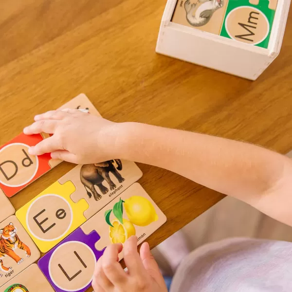 imageMelissa ampamp Doug SelfCorrecting Alphabet Wooden Puzzles With Storage Box 52 pcs