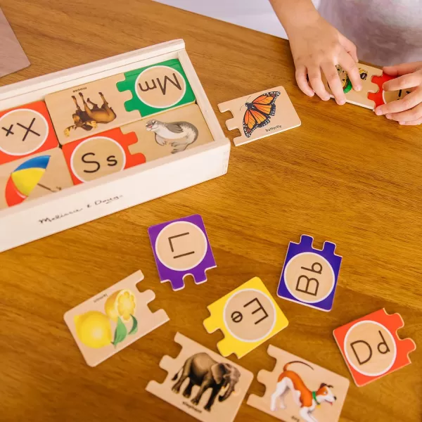 imageMelissa ampamp Doug SelfCorrecting Alphabet Wooden Puzzles With Storage Box 52 pcs