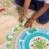 imageMelissa ampamp Doug Round The Shore Tracks Cardboard Jigsaw Floor Puzzle and WindUp Vehicles  48 Pieces for Boys and Girls 4  FSCCertified