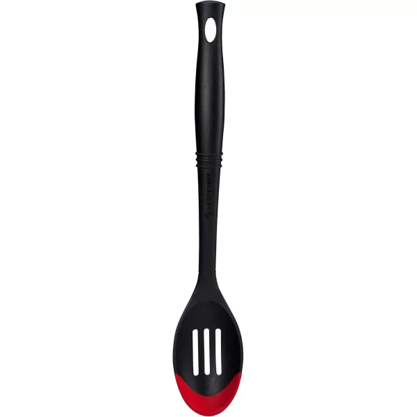 imageLe Creuset Revolution BiMaterial Slotted Turner 135quot x 25quot CeriseCerise Cherry Red