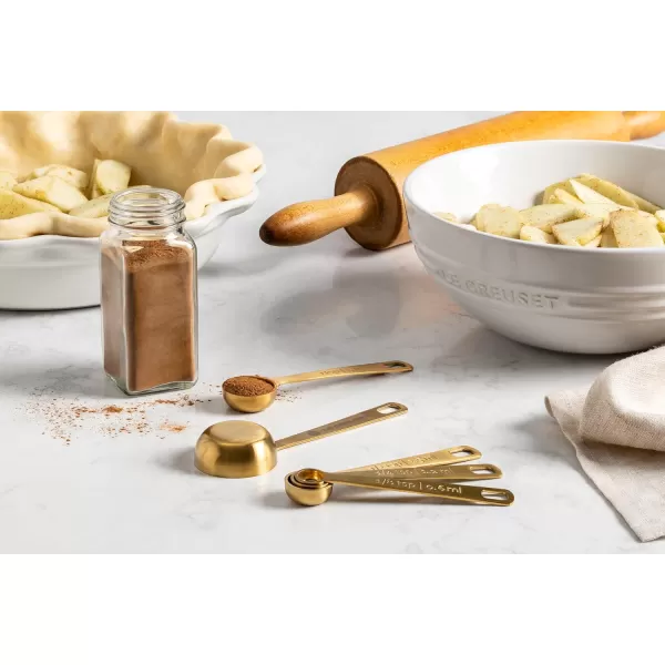 imageLe Crueset Measuring Cups Gold Set of 4 1121314 cupsMeasuring Spoons