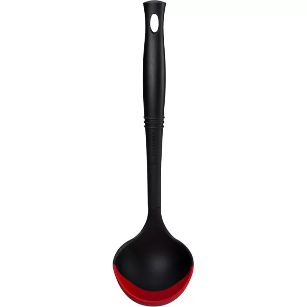 imageLe Creuset Revolution BiMaterial Slotted Turner 135quot x 25quot CeriseCerise Cherry Red