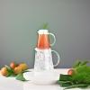 imageTea Forte Tea Over Ice Steeping Tea Pitcher Set of Two 12oz Glass Ice Tea Pitcher and 24 oz Pitcher for Perfect Flash Chilled Ice Tea Dishwasher Safe