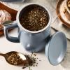 imageTea Forte Demoiselle Fiore Ceramic 14 ounce Tea Mug with Infuser and Lid Ceramic Cup with Handle for Steeping Loose Leaf Teas Dishwasher ampamp Microwave SafeStone Blue
