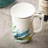 imageTea Forte Demoiselle Fiore Ceramic 14 ounce Tea Mug with Infuser and Lid Ceramic Cup with Handle for Steeping Loose Leaf Teas Dishwasher ampamp Microwave SafeBlue Agave
