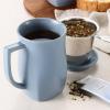 imageTea Forte Demoiselle Fiore Ceramic 14 ounce Tea Mug with Infuser and Lid Ceramic Cup with Handle for Steeping Loose Leaf Teas Dishwasher ampamp Microwave SafeStone Blue