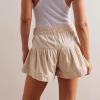 imageCHARTOU Women Cute Ruffle Hem Denim Short High Waist Wide Leg Jean Shorts Flare Stretchy Short with PocketsApricot
