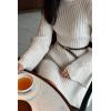 imageCHARTOU Women Rib Knitted Sweater Dress Fall Crewneck Flared Long Sleeve Ruffle Peplum Mini Dress with BeltBeige
