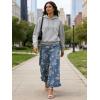 image:imageCHARTOU Women Y2k Crop Ruffle Hem Wide Leg Jeans Baggy Floral Print Patchwork Ankle Denim Pants with PocketsBlue