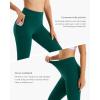 imageStelle Womens Yoga Pants with Pockets High Waisted Capri Leggings Tummy Control Workout Cycling PantsForest Green