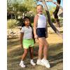 imageStelle Girls Athletic Shorts with Liner Zipper Pockets Elastic Waist Running Shorts Sports Active Shorts for Teen KidsNeon Yellow