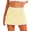 imageStelle Women Tennis Skirt Golf Skorts Athletic High Waisted with Pockets Inner Shorts Sport Workout Pleated PickleballLemon Butter
