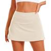 imageStelle Women Tennis Skirt Golf Skorts Athletic High Waisted with Pockets Inner Shorts Sport Workout Pleated PickleballWhite Beige